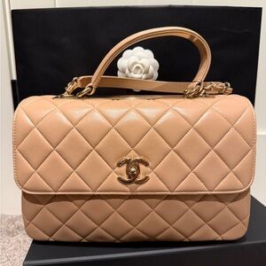 Chanel Flap bag with handle.  Beige